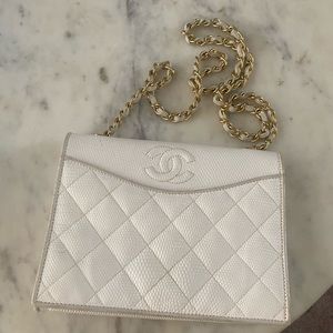 White Vintage Chanel crossbody.